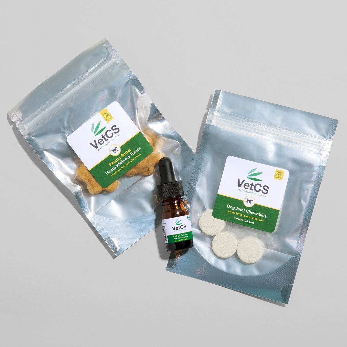VetCS CBD sample pack for dogs – includes dropper bottle, joint chewables, and peanut butter treats