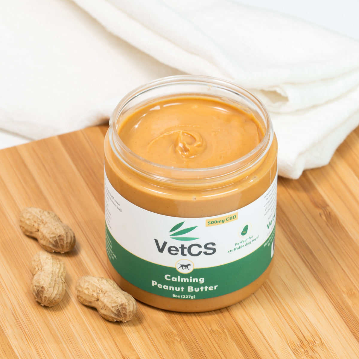 Calming CBD peanut butter for dogs, easy to add to stuffable dog toys!