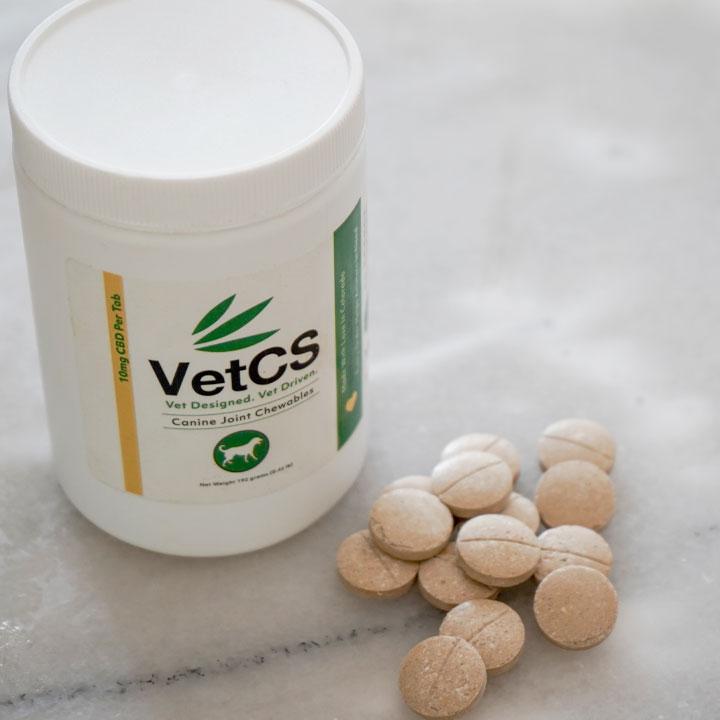 Photo of VetCS CBD dog chewables on a kitchen table 